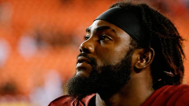Aug 20, 2021; Landover, Maryland, USA; Washington Football Team strong safety Landon Collins (26) walks off the field after the Washington Football Team’s game against the Cincinnati Bengals at FedExField.